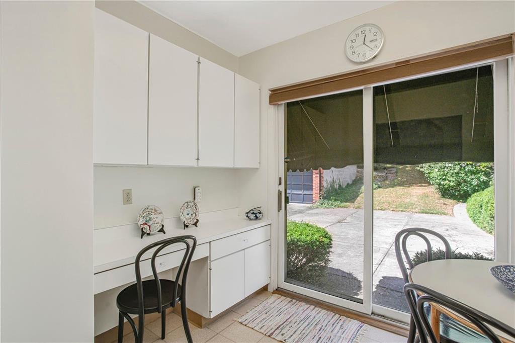 1232 Murdoch Road Pittsburgh, PA 15217 - Photo 13 of 38 a view of a table and chairs in patio