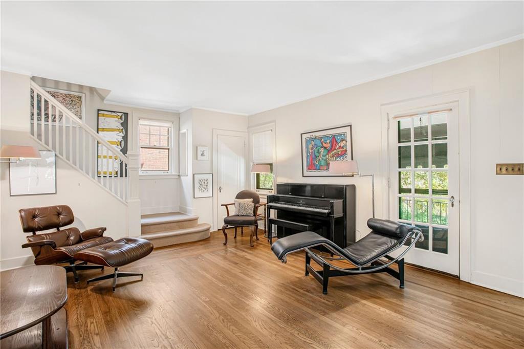 1232 Murdoch Road Pittsburgh, PA 15217 - Photo 15 of 38 a living room with furniture a piano and a window