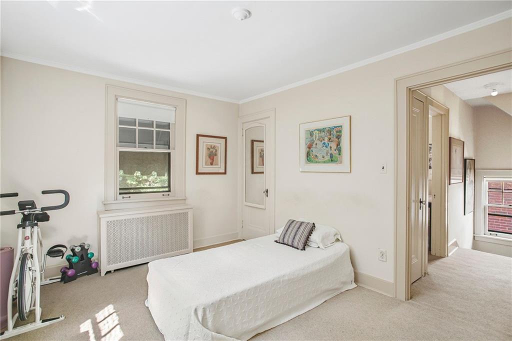 1232 Murdoch Road Pittsburgh, PA 15217 - Photo 20 of 38 a bedroom with a bed and a window