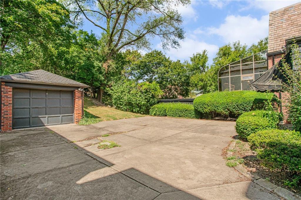 1232 Murdoch Road Pittsburgh, PA 15217 - Photo 32 of 38 a front view of a house with garden