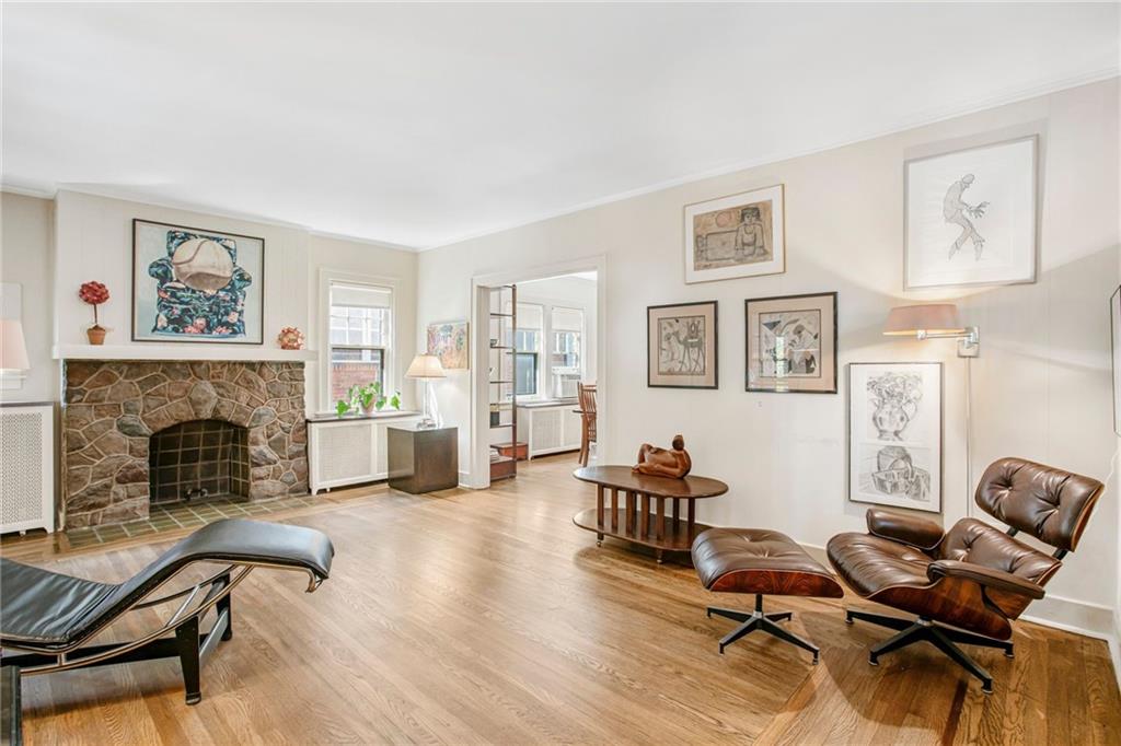 1232 Murdoch Road Pittsburgh, PA 15217 - Photo 8 of 38 a living room with furniture and a fireplace