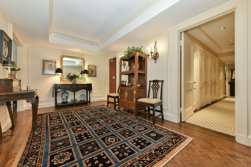 81 Beacon Street, Unit 3 Boston, MA 02108 - Photo 2 of 7 a bedroom with furniture and a rug