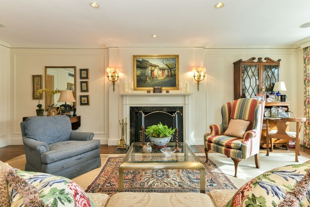 81 Beacon Street, Unit 3 Boston, MA 02108 - Photo 4 of 7 a living room with furniture and a fireplace