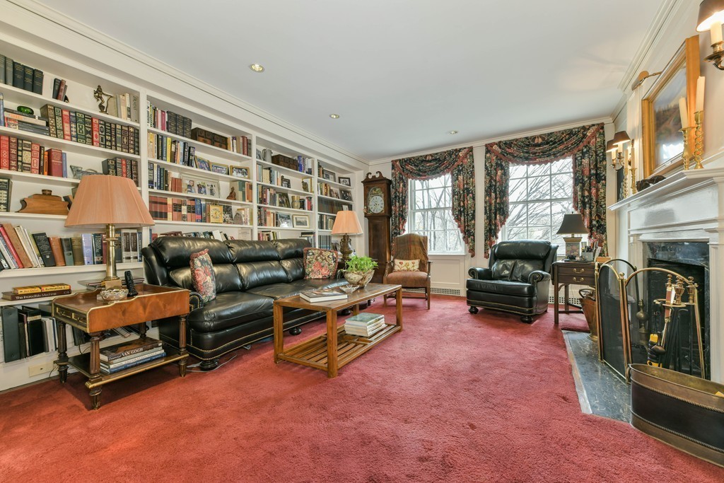 81 Beacon Street, Unit 3 Boston, MA 02108 - Photo 6 of 7 a living room with furniture and a fireplace