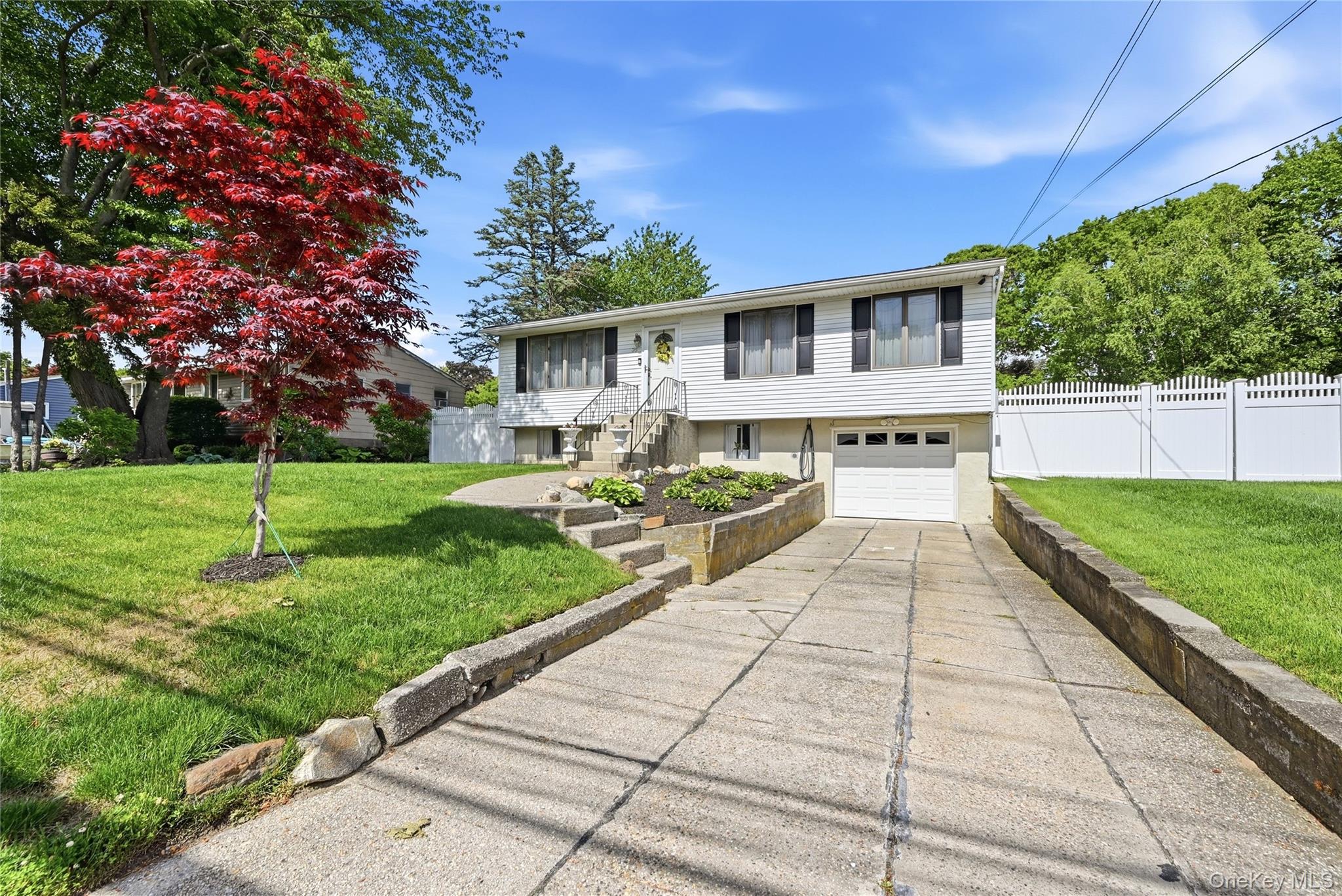 35 Randall Road Shoreham, NY 11786 - Photo 1 of 32 a front view of a house with a yard