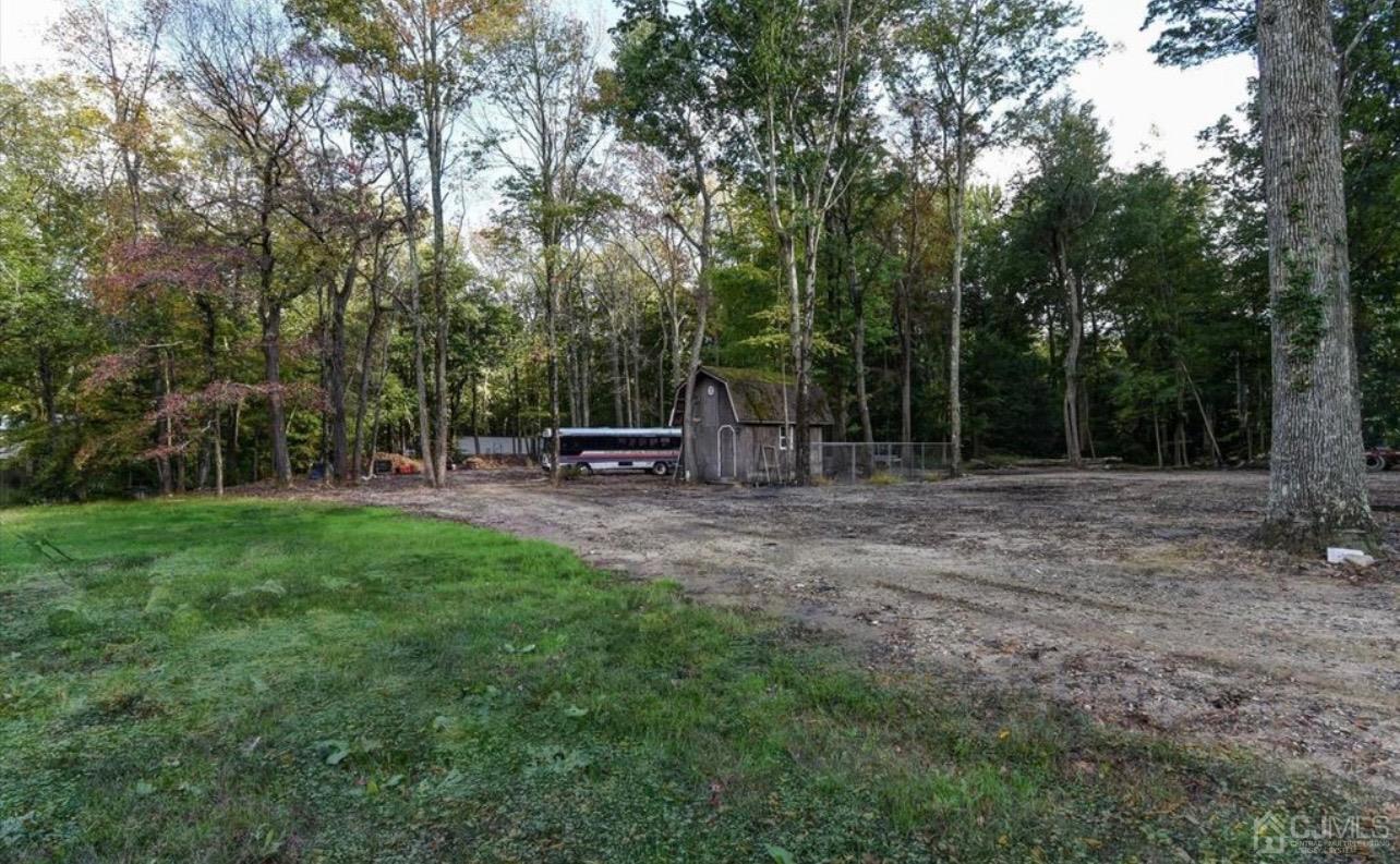 58 Miller Road Cranbury, NJ 08512 - Photo 4 of 4 a view of outdoor space with backyard and entertaining space