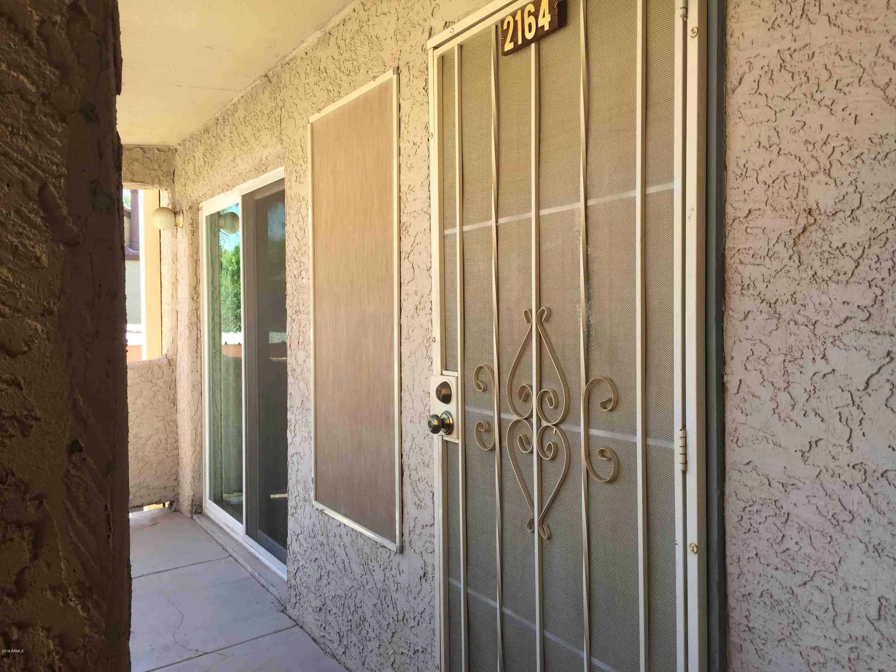 1645 West Baseline Road, Unit 2164 Mesa, AZ 85202 - Photo 15 of 71 SHADED ENT UNDER SHADED BALCONY - P3921
