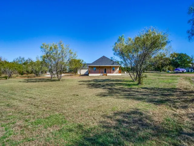 a house view with garden space
