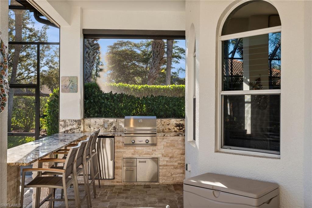 12553 Grandezza Circle Estero, FL 33928 - Photo 17 of 46 a view of balcony with furniture