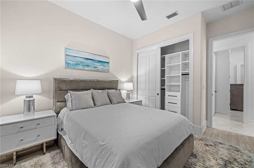 12553 Grandezza Circle Estero, FL 33928 - Photo 29 of 46 a bed room with a bed and a closet