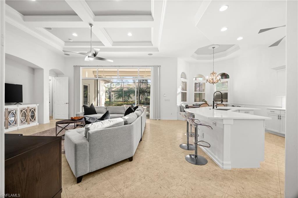 12553 Grandezza Circle Estero, FL 33928 - Photo 4 of 46 a living room with furniture and a flat screen tv