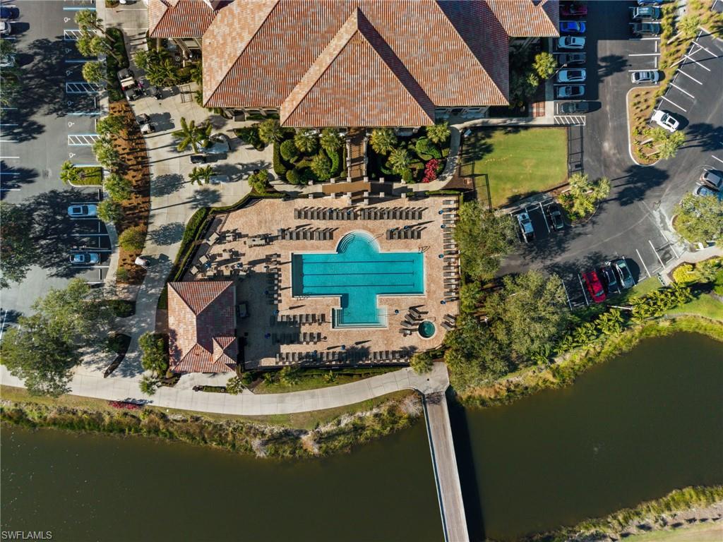 12553 Grandezza Circle Estero, FL 33928 - Photo 43 of 46 a view of a house with a yard and sitting area