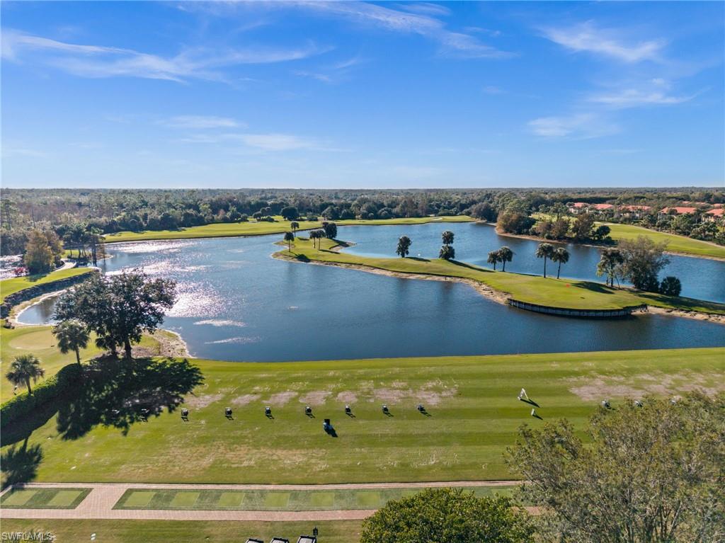 12553 Grandezza Circle Estero, FL 33928 - Photo 45 of 46 a view of a swimming pool with an ocean view