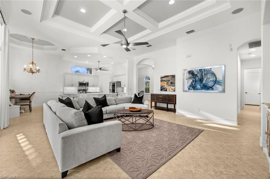 12553 Grandezza Circle Estero, FL 33928 - Photo 7 of 46 a living room with furniture and view of kitchen