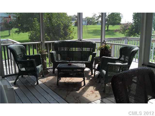 804 Deese Road Monroe, NC 28110 - Photo 3 of 16 a building outdoor space with patio furniture