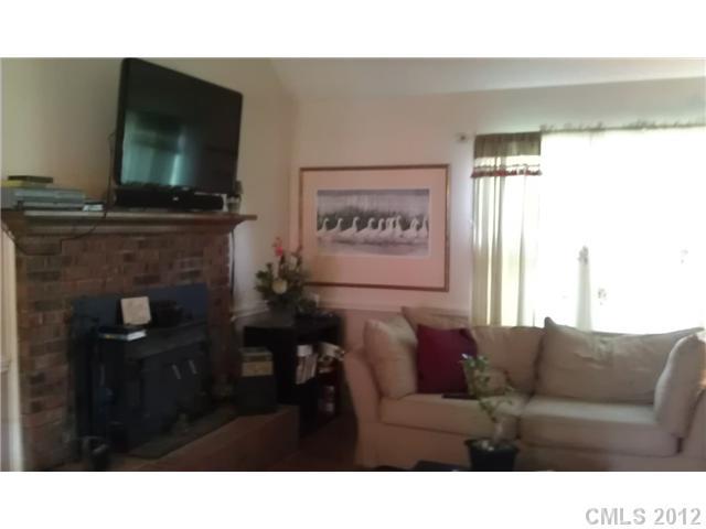 804 Deese Road Monroe, NC 28110 - Photo 6 of 16 a living room with furniture and a flat screen tv