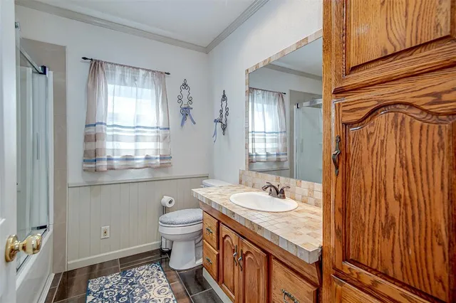 a utility room with a sink a washer and dryer
