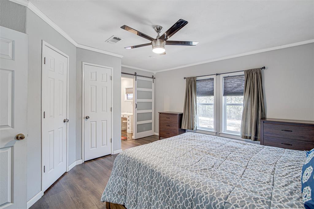 2521 Timber Road Burleson, TX 76028 - Photo 24 of 34 a bedroom with a bed and a large window