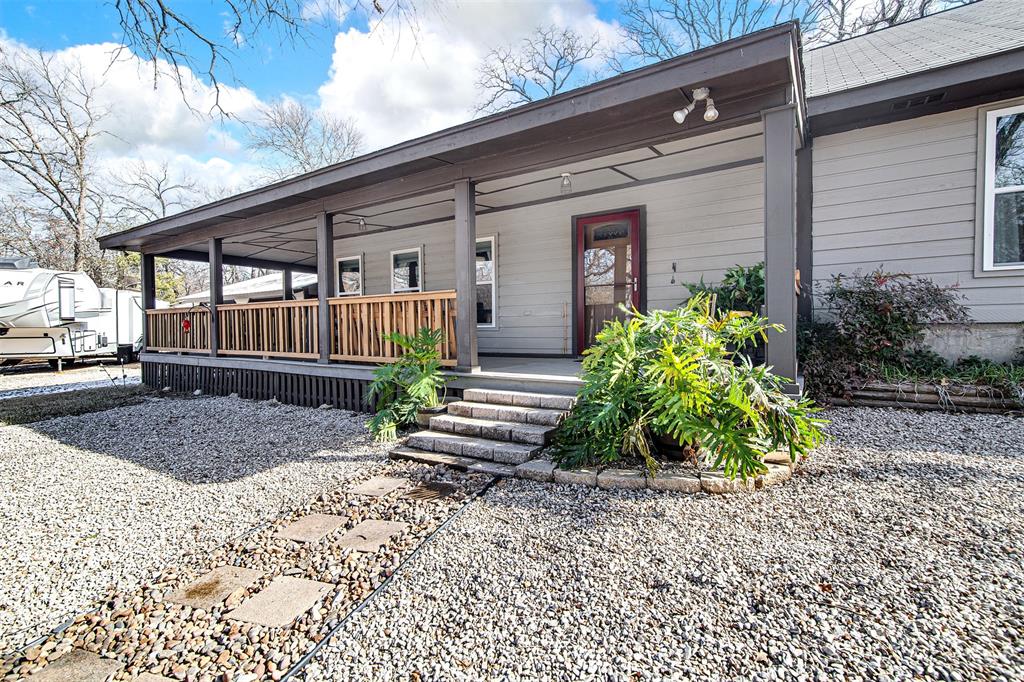 2521 Timber Road Burleson, TX 76028 - Photo 28 of 34 a front view of a house with garden