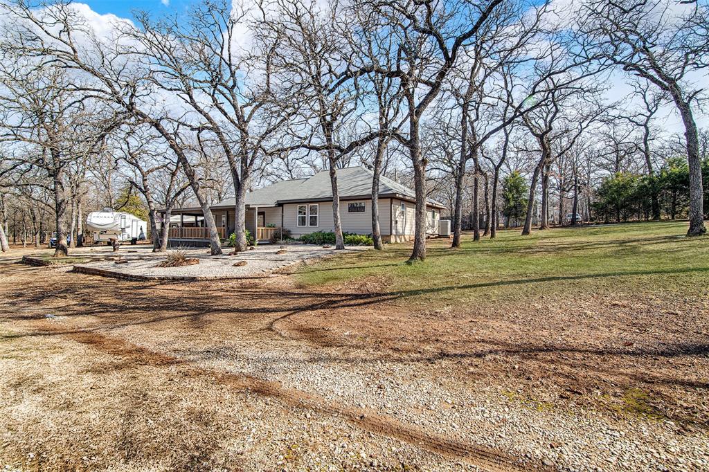 2521 Timber Road Burleson, TX 76028 - Photo 29 of 34 a view of road with large trees