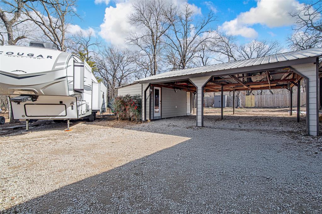 2521 Timber Road Burleson, TX 76028 - Photo 31 of 34 a view of a house with a snow in the yard