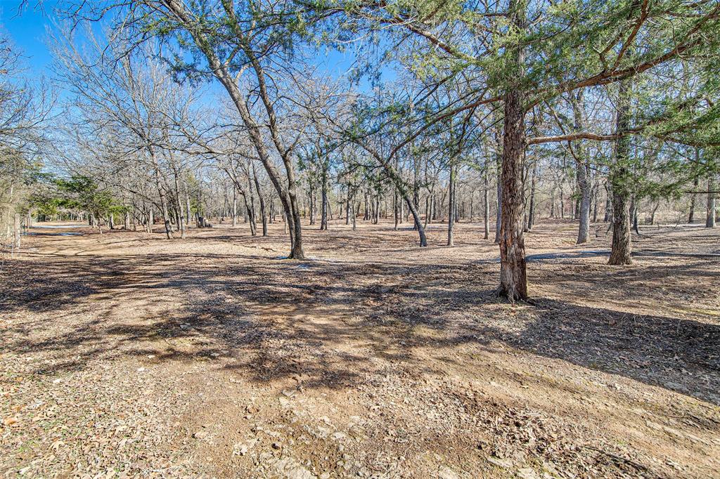 2521 Timber Road Burleson, TX 76028 - Photo 32 of 34 a view of empty space with trees