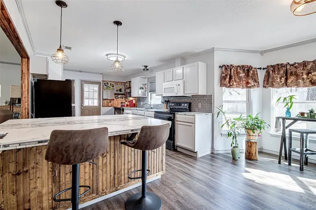 a workspace with furniture and window