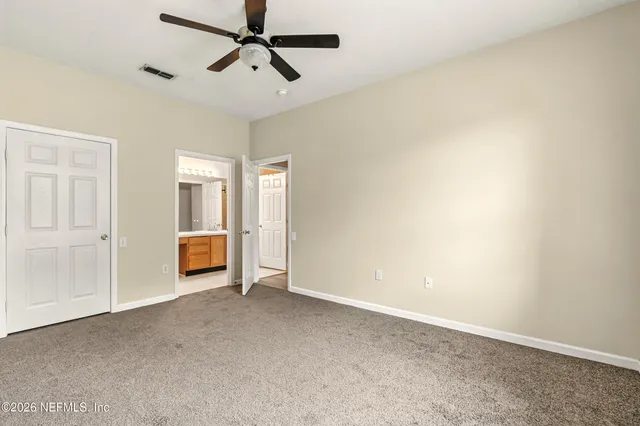 a view of a livingroom with a staircase