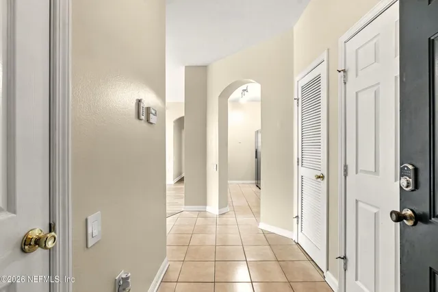 a view of a bathroom from the hallway