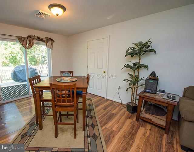 31403 Melson Road Delmar, MD 21875 - Photo 2 of 38 a view of a dining room with furniture window and wooden floor