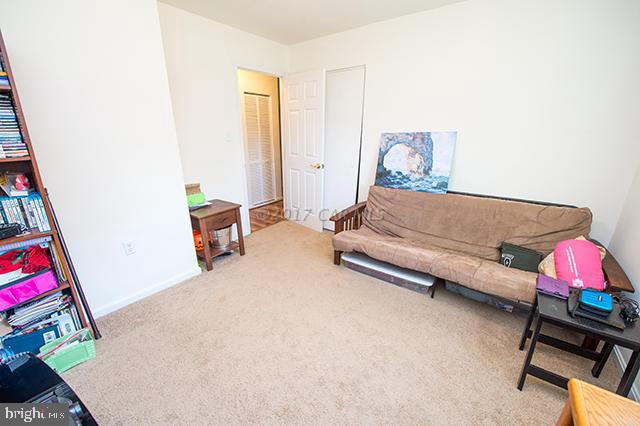 31403 Melson Road Delmar, MD 21875 - Photo 17 of 38 a living room with furniture and a window