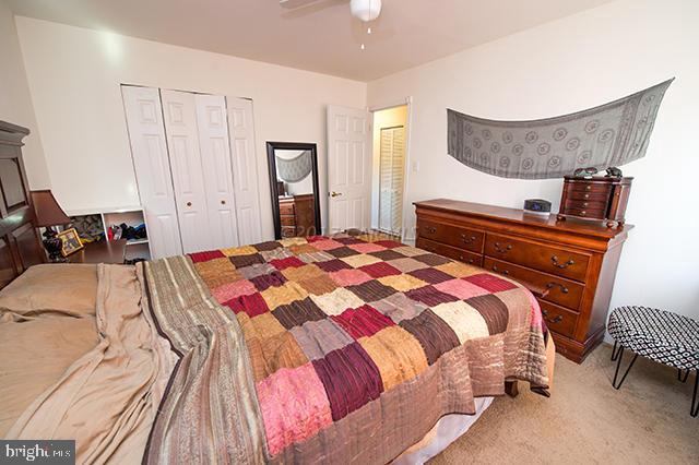 31403 Melson Road Delmar, MD 21875 - Photo 19 of 38 a bedroom with a bed and chair