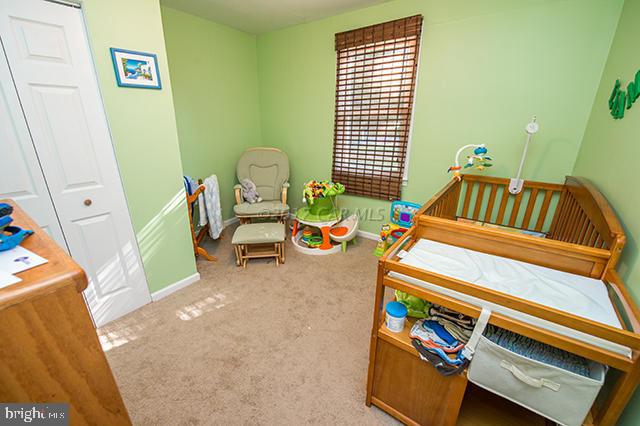 31403 Melson Road Delmar, MD 21875 - Photo 20 of 38 a room with furniture and a window