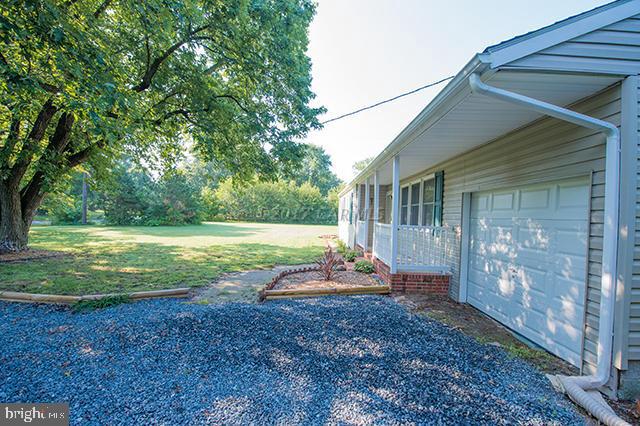 31403 Melson Road Delmar, MD 21875 - Photo 28 of 38 a view of a house with backyard and a garden