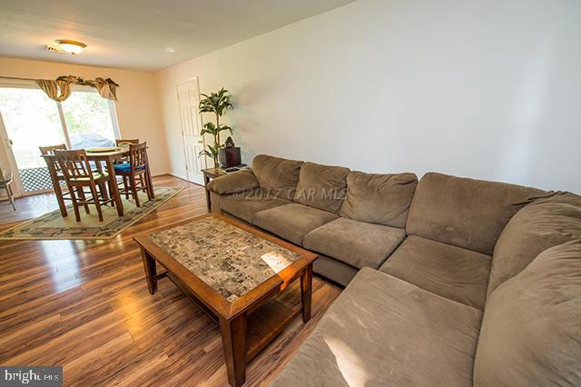 31403 Melson Road Delmar, MD 21875 - Photo 4 of 38 a living room with furniture and wooden floor