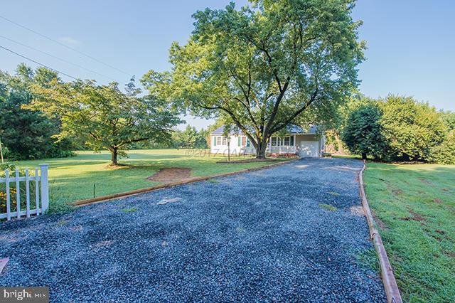 31403 Melson Road Delmar, MD 21875 - Photo 32 of 38 a view of outdoor space with green field and trees