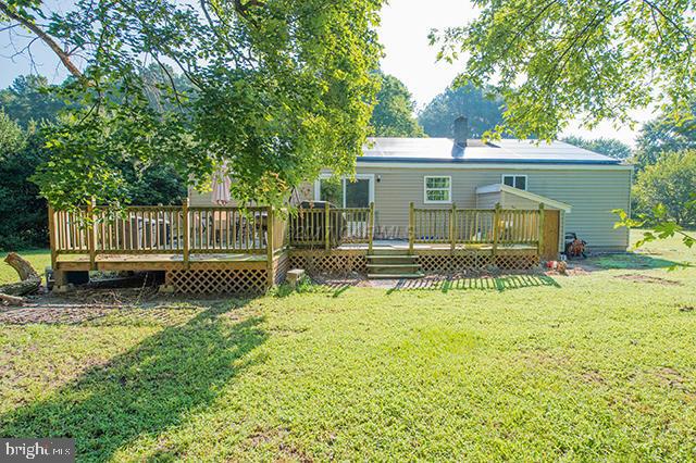 31403 Melson Road Delmar, MD 21875 - Photo 36 of 38 a view of a house with backyard and a tree