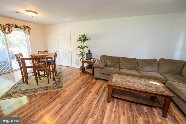 31403 Melson Road Delmar, MD 21875 - Photo 5 of 38 a living room with furniture and wooden floor