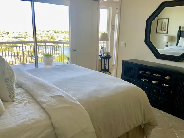 a kitchen with a refrigerator and cabinets