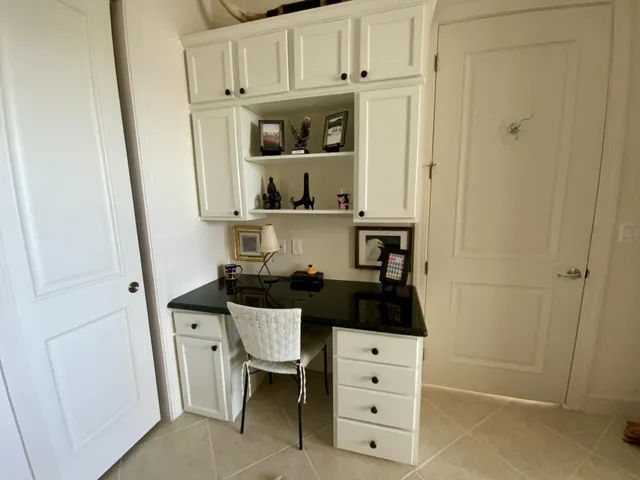 a bathroom with double sink and a mirror