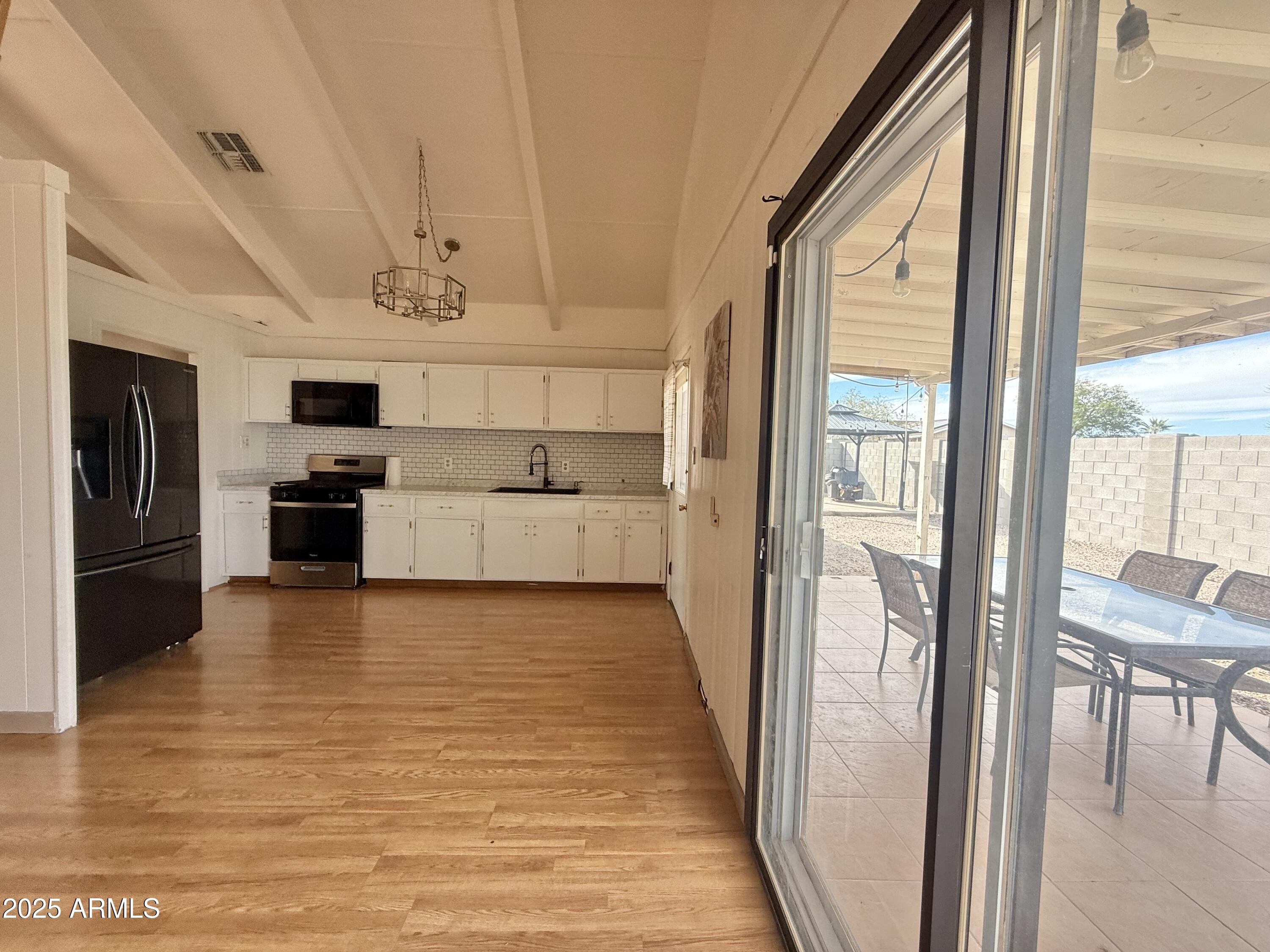 150 West North Street Ajo, AZ 85321 - Photo 12 of 37 a view of a kitchen from the hallway