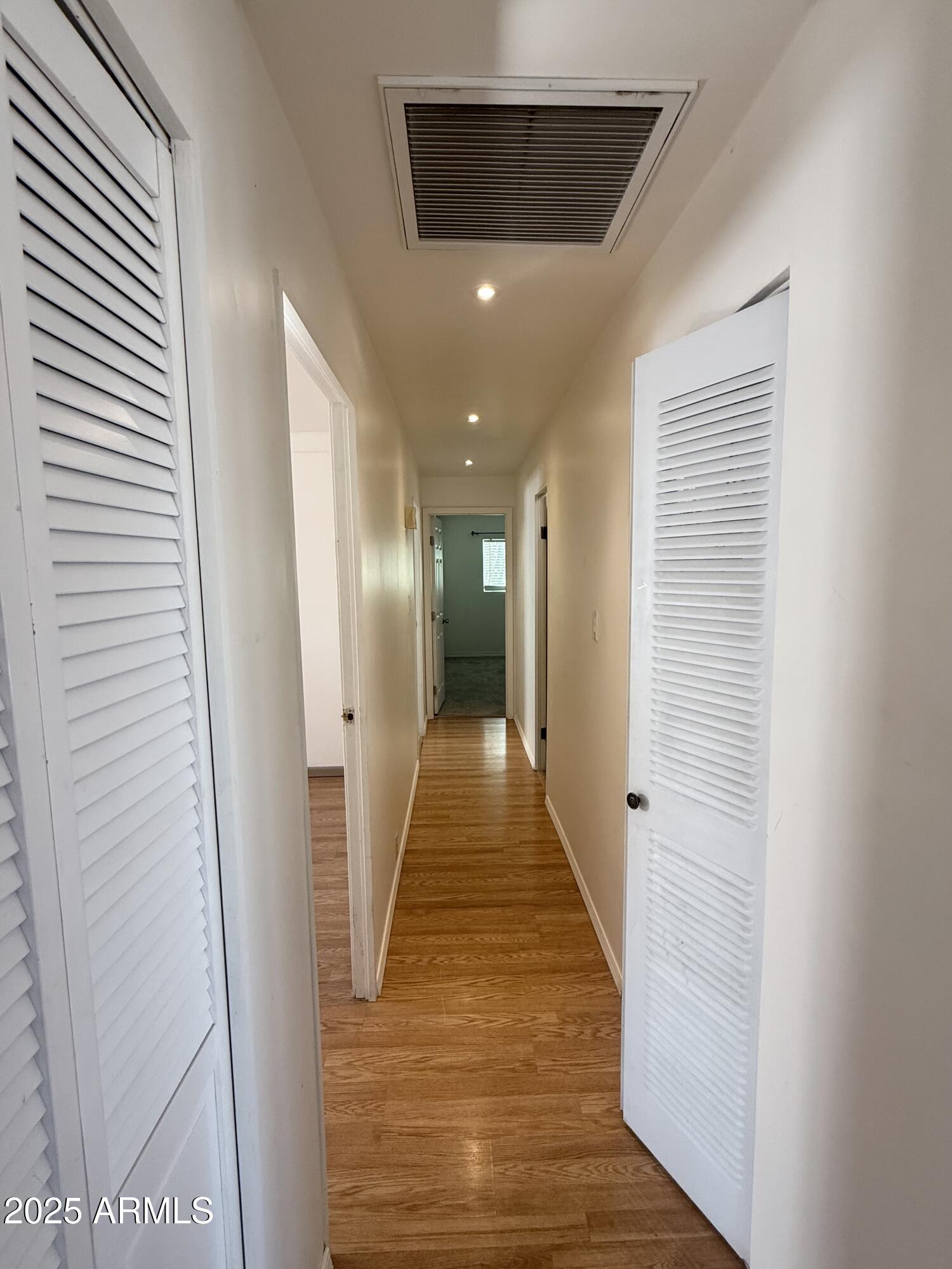 150 West North Street Ajo, AZ 85321 - Photo 13 of 37 a view of a hallway with wooden floor