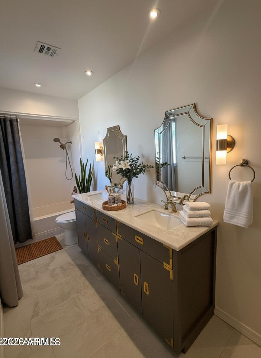150 West North Street Ajo, AZ 85321 - Photo 22 of 37 a spacious bathroom with a sink a mirror and shower