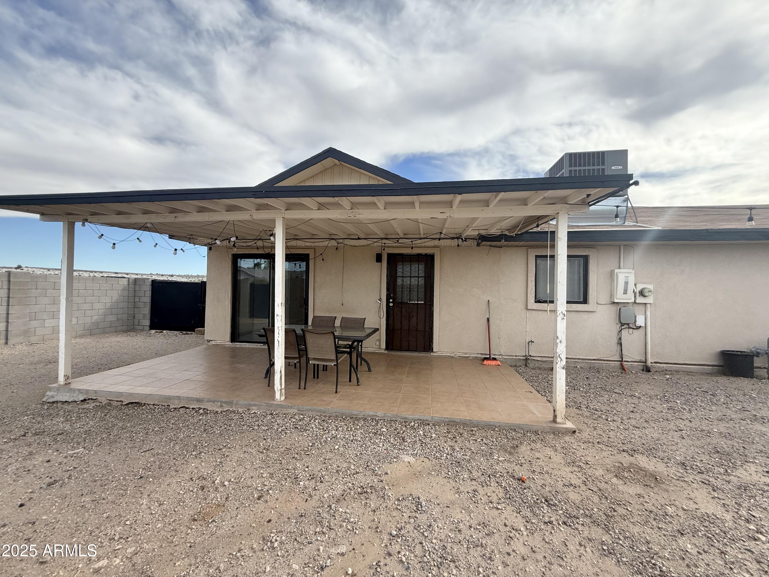 150 West North Street Ajo, AZ 85321 - Photo 30 of 37 a view of a house with a patio