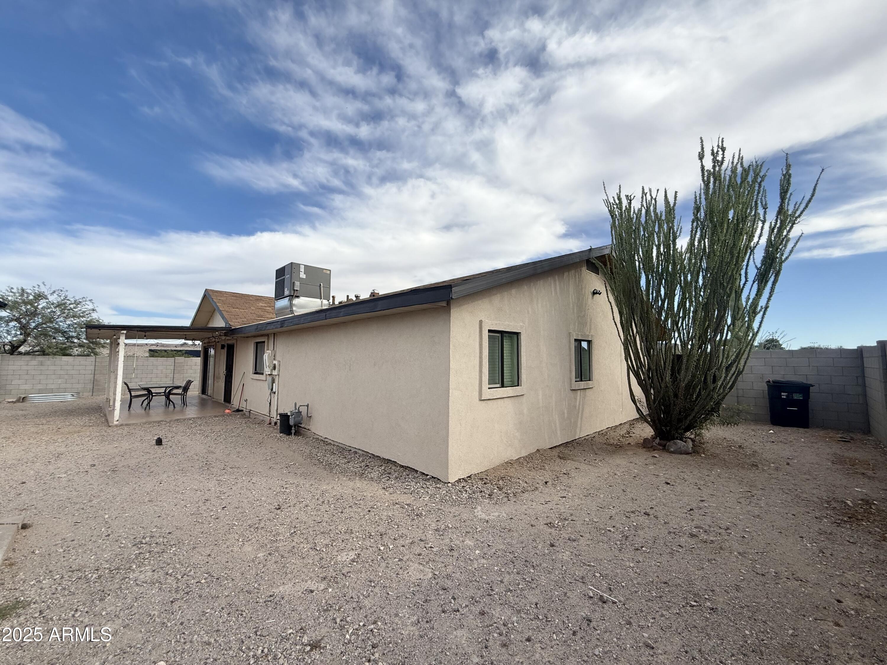 150 West North Street Ajo, AZ 85321 - Photo 32 of 37 a view of a house with a yard and garage