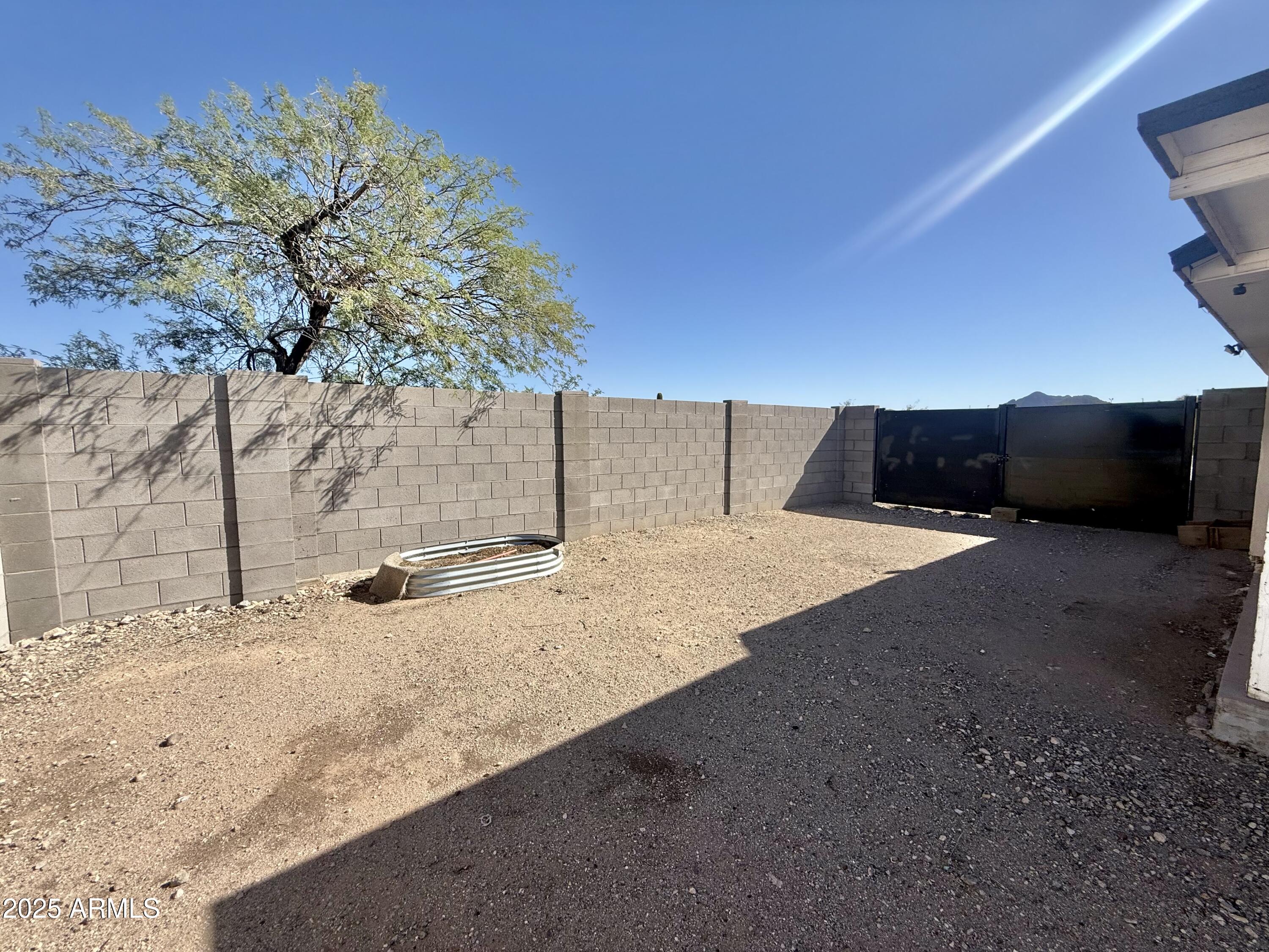 150 West North Street Ajo, AZ 85321 - Photo 36 of 37 a view of a backyard of the house