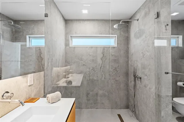 a view of a hallway with seating area