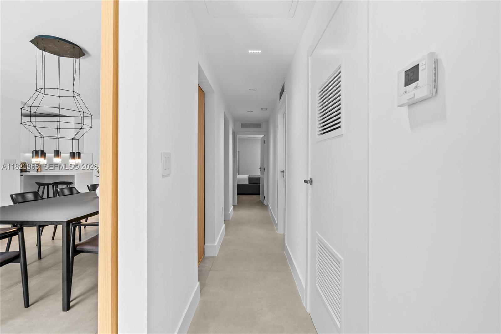 9033 Emerson Avenue Surfside, FL 33154 - Photo 19 of 40 a view of a hallway with seating area