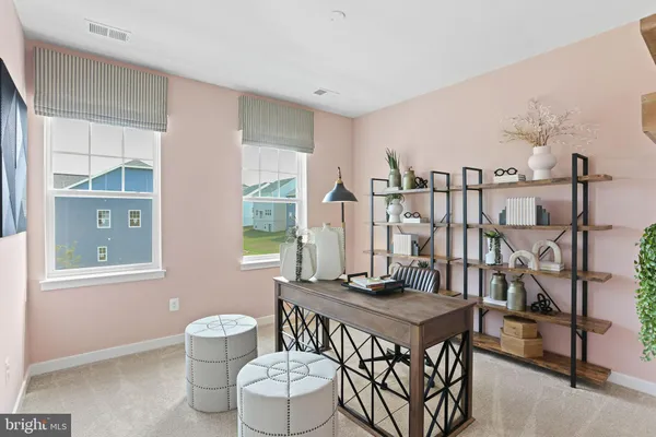 a view of a livingroom with furniture and window