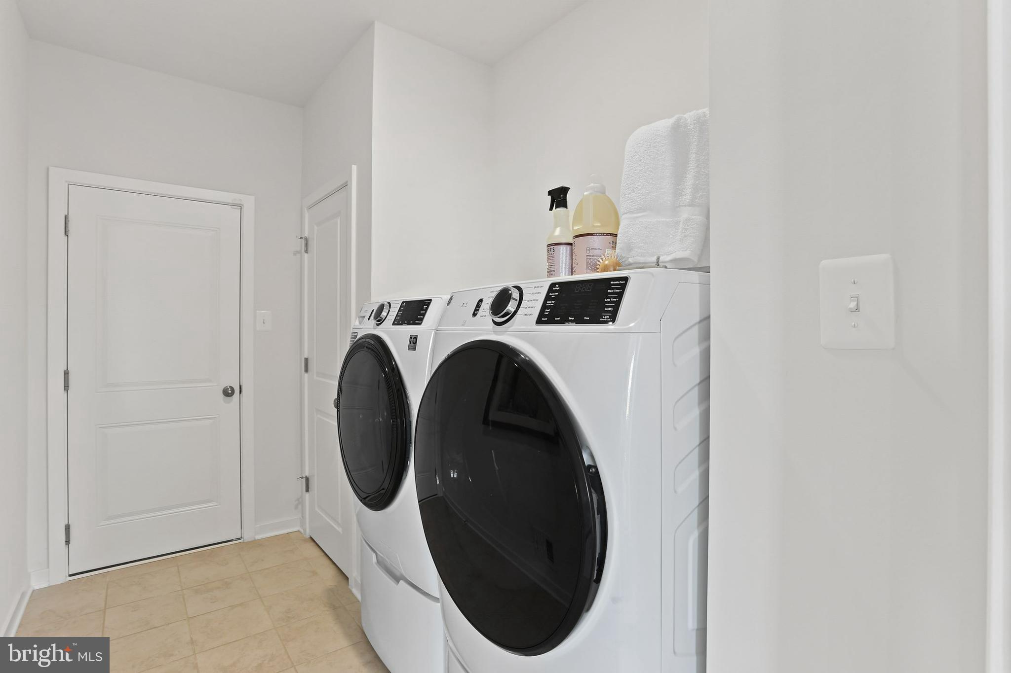 400 Silver Birch Drive Ranson, WV 25438 - Photo 7 of 15 a utility room with dryer and washer